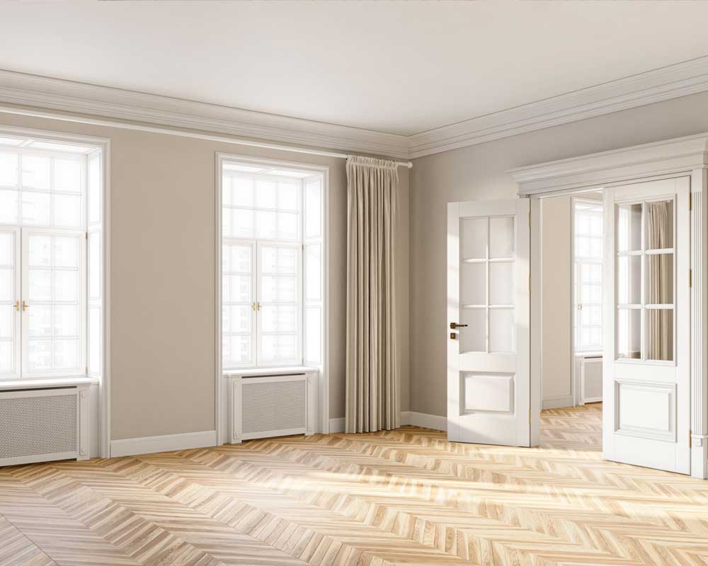Period skirting and architraves, installed as a system. Coordinated bespoke internal joinery in a period room.