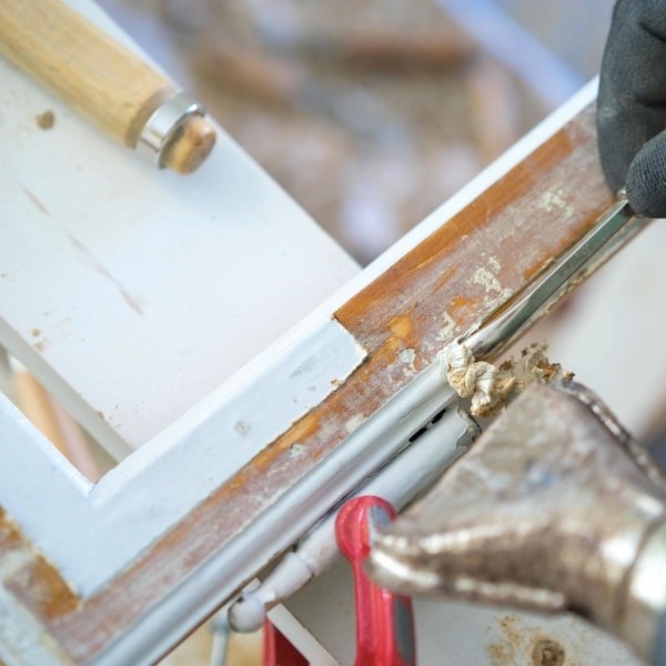 A bespoke window frame being restoring